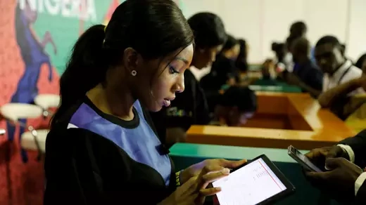 Youths are seen browsing the internet at the launch of Google's free WiFi project in Lagos, Nigeria on July 26, 2018.