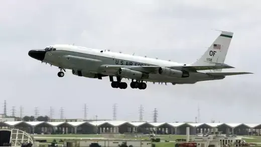 A U.S. electronics intelligence collection aircraft takes off from Japan's Kadena Air Base.