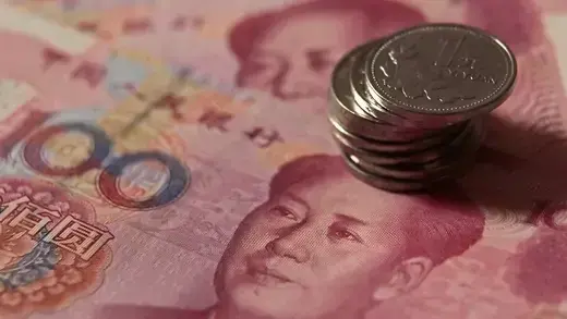 Chinese yuan coins and banknotes.