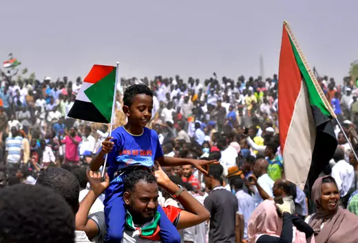  Sudanese demonstrators celebrate after the announcement that President Omar al-Bashir had been detained and a military council would run the country for a two-year transitional period, Khartoum, Sudan April 11, 2019.