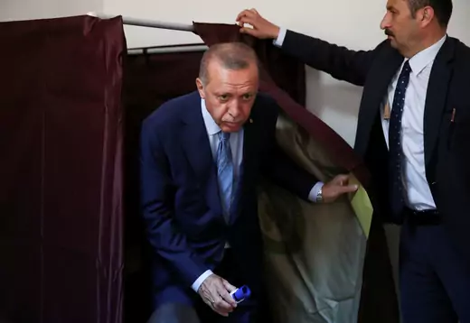 Turkish President Tayyip Erdogan leaves the voting booth at a polling station in Istanbul, Turkey June 24, 2018.
