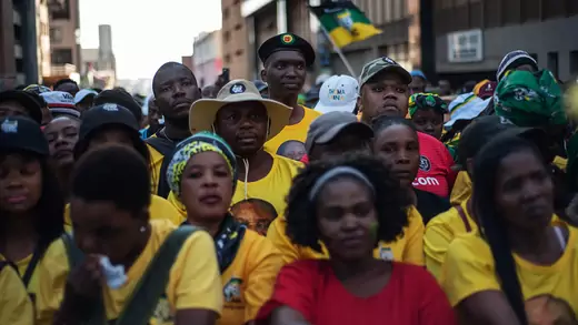 African National Congress supporters listen to South African President Cyril Ramaphosa during an election victory rally on May 12, 2019, in central Johannesburg. (Photo by Michele Spatari/NurPhoto via Getty Images)