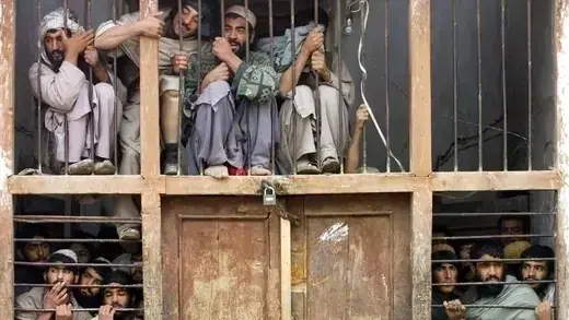 Former Taliban fighters at a jail complex in Shebargan.