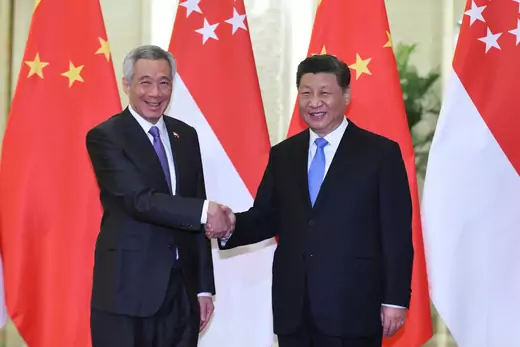 Singapore’s Prime Minister Lee Hsien Loong shakes hands with China's President Xi Jinping before their meeting at the Great Hall of the People in Beijing, China April 29, 2019.