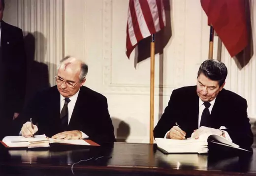 Presidents Ronald Reagan and Mikhail Gorbachev sign the INF Treaty at the White House.