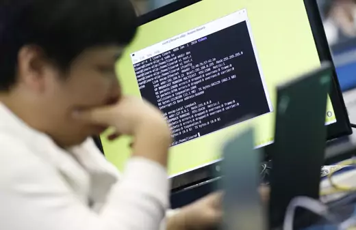 A student attends a hackers competition in Seoul.