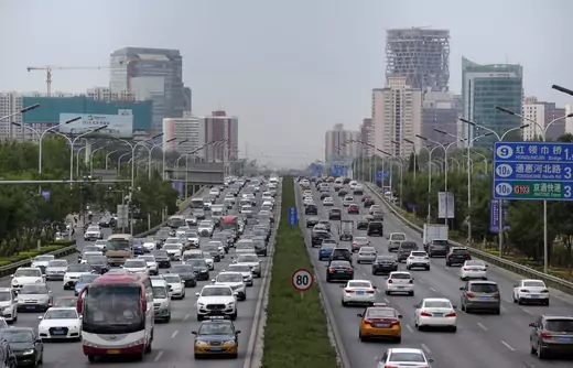 Cars drive on the road during the morning rush hour in Beijing, China, July 2, 2019. 