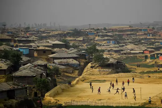 Rohingya refugees play football at Kutupalong refugee camp in Cox's Bazar, Bangladesh, March 27, 2018. 