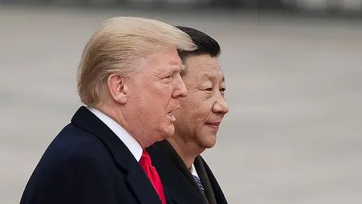 Presidents Trump and Xi stand next to one another during a November 2017 meeting in Beijing. 