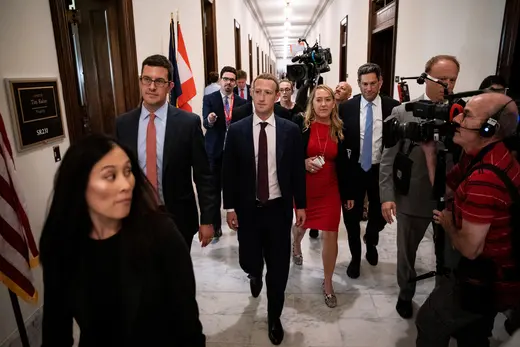 Facebook Chief Executive Mark Zuckerberg walks past members of the news media as he walks to the office of U.S. Senator Josh Hawley (R-MO) while meeting with lawmakers to discuss "future internet regulation" on Capitol Hill in Washington, U.S., September 19, 2019.