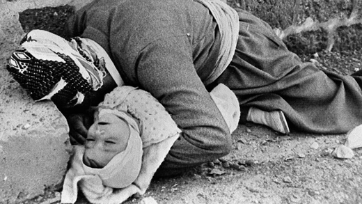 A father and an infant lay dead on the street. Both were killed in a chemical attack carried out by Saddam Hussein on the city of Halabja, in northeastern Iraq, in March 1988.  