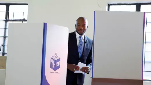 Mmusi Maimane casts his vote at a polling station