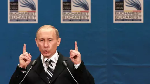 Vladimir Putin speaking at the NATO summit in 2008
