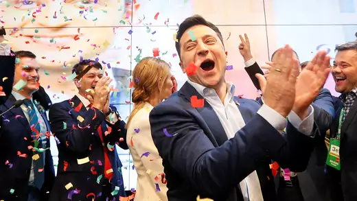 Volodymyr Zelensky applauds during the 2019 presidential election