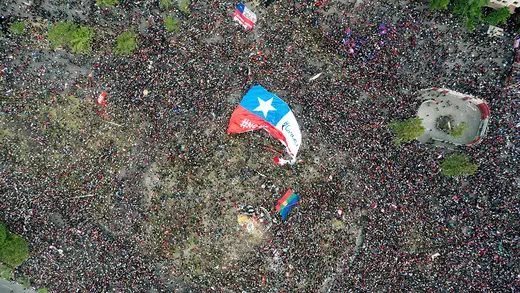 An aerial image of people protesting in Santiago, Chile.