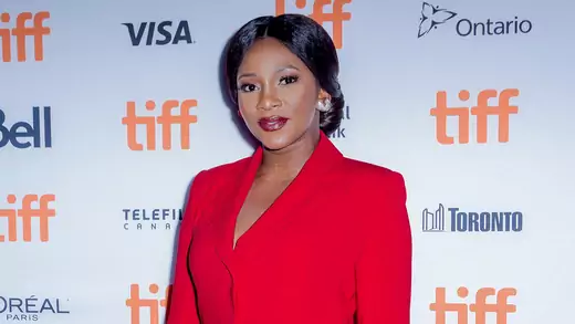 Genevieve Nnaji, a Nigerian actress, poses in a red suit at the Toronto Film Festival.