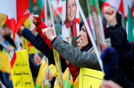 People attend a protest organised by National Council of Resistance of Iran in Germany to support nationwide demonstrations in Iran against the rise in gasoline prices, in Berlin, Germany November 17, 2019.