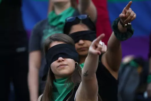 Women during a demonstration against gender violence at Angel de la Independencia monument in Mexico City, Mexico.