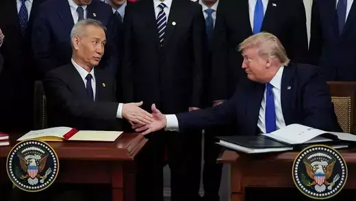 Vice Premier Liu He shakes President Donald Trump's hand