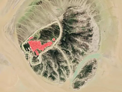Satellite image of Bhasan char island with red roofs of settlement under construction.