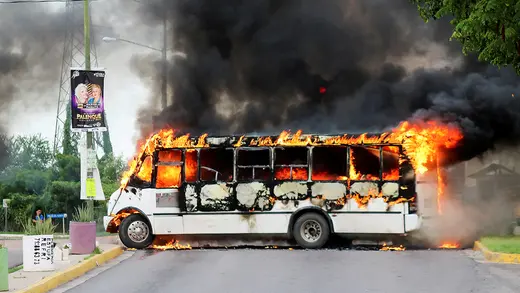 A bus on fire.