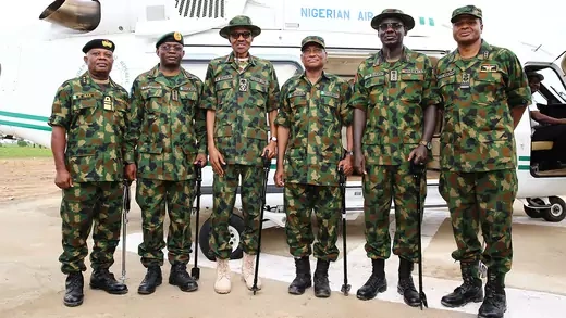  President Mohammadu Buhari poses with Nigeria's senior military officers during the Army Day celebration in Dansadau, northwest Nigerian Zamfara State, on July 13, 2016.