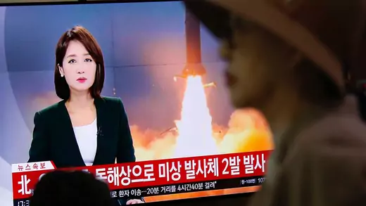 People watch a TV broadcast showing file footage for a news report in Seoul, South Korea, on October 31, 2019 on North Korea firing two projectiles, possibly missiles, into the sea between the Korean Peninsula and Japan. 