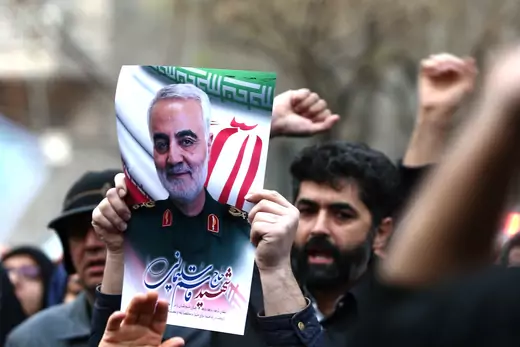 Demonstrators hold a picture of Qassim Suleimani as they protest his assassination by the United States in Tehran, Iran, on January 3. Nazanin Tabatabaee/West Asia News Agency via Reuters. 