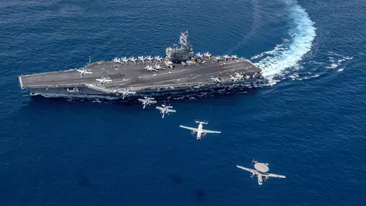 Aircraft fly from the aircraft carrier USS Ronald Reagan in the Indo-Pacific