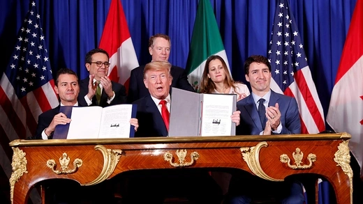 U.S. President Donald Trump, Canadian Prime Minister Justin Trudeau, and Mexican President Enrique Peña Nieto at USMC signing in 2018