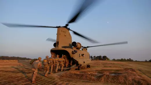 Members of South Korean and U.S. Special Forces enter a CH-47 Chinook during a joint military exercise conducted in Gangwon province, South Korea, on November 7, 2019. 