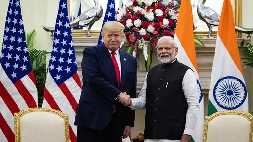 Trump and Modi shaking hands