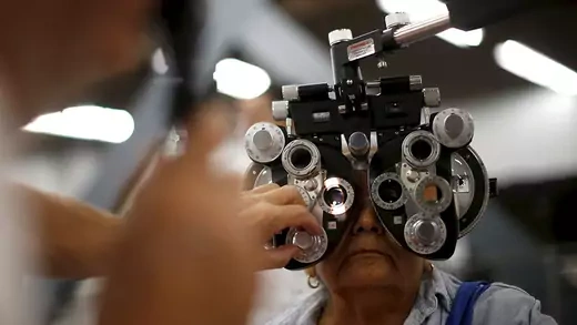 A woman receiving an eye examination