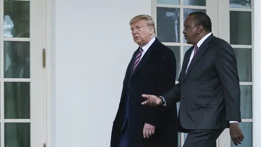  U.S. President Donald J. Trump walks with Kenyan President Uhuru Kenyatta on the White House colonnade on February 6, 2020.