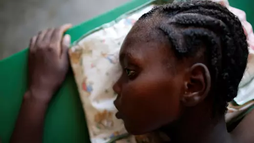 A girl receives treatment for cholera at a hospital in Jeremie, Haiti, in October 2016.