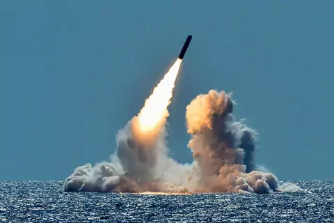 Ballistic missile being launched from the ocean. 