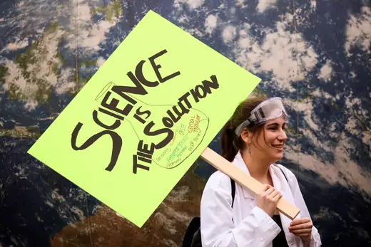 A protestor holds a sign in support of science during the March For Science in Seattle, Washington.