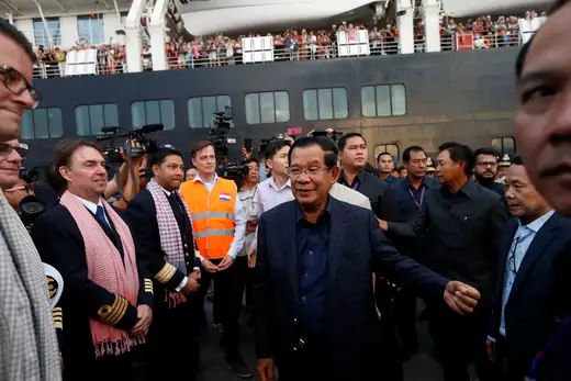 Cambodia's Prime Minister Hun Sen welcomes crews of MS Westerdam, a cruise ship that spent two weeks at sea after being turned away by five countries over fears that someone aboard might have the coronavirus, as it docks in Sihanoukville, Cambodia on February 14, 2020.