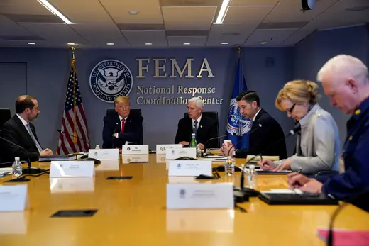 President Trump and Vice President Pence attend a meeting in the FEMA headquarters.