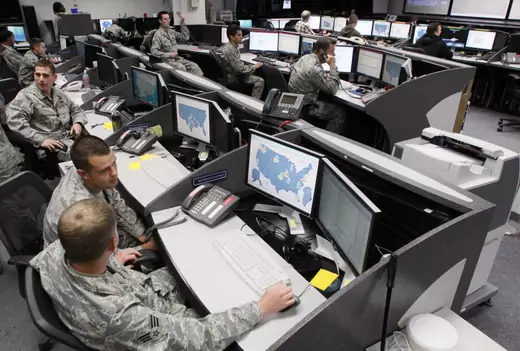 Personnel work at the Air Force Space Command Network Operations & Security Center at Peterson Air Force Base in Colorado Springs.