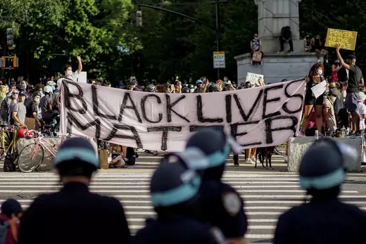 Demonstrators hold a Black Lives Matter banner during a protest against racial inequality in New York City.