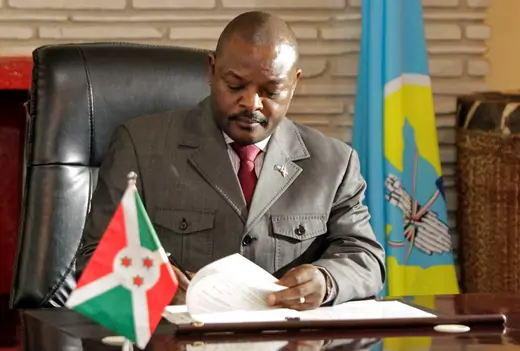 Burundi's President Pierre Nkurunziza signs the new constitution at the presidential palace in Gitega Province, Burundi June 7, 2018