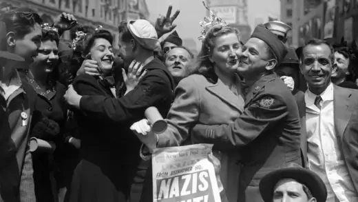 New Yorkers celebrate the surrender of Nazi Germany in Times Square.