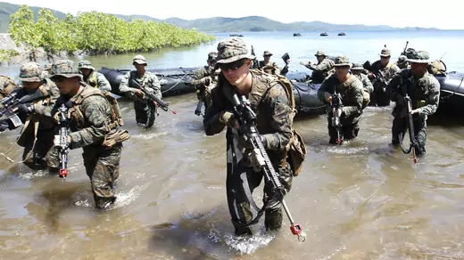 Philippine and U.S. marines conduct a joint military drill in Palawan Province, facing the South China Sea, on April 25, 2012.