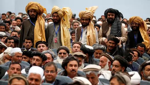 Afghan men attend a consultative grand assembly, known as Loya Jirga, in Kabul, Afghanistan, on April 29, 2019