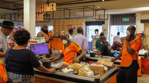 Customers shop for essential commodities inside the Naivas supermarket as residents stock their homes amid concerns about the spread of coronavirus disease (COVID-19) in Nairobi, Kenya March 23, 2020.