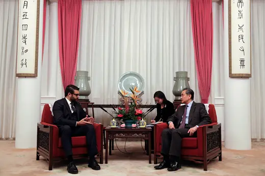 Afghan National Security Advisor Hamdullah Mohib talks to Chinese Foreign Minister Wang Yi during a meeting in Beijing, China, on January 10, 2019.