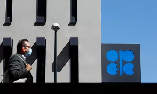 A person passes by the OPEC headquarters