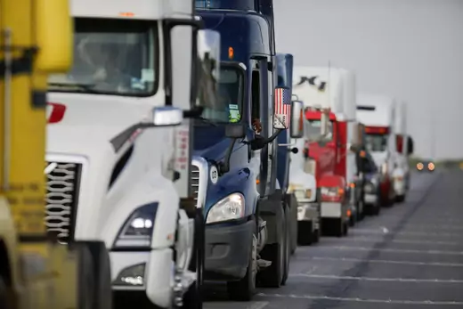 Trucks wait in a long queue for border customs control