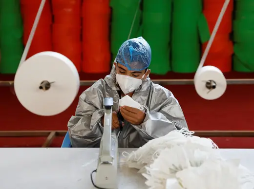A worker at a mask factory in Kabul, Afghanistan. 